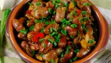 Курячі сердечка з помідорами і перцем