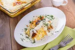 Картопляна запіканка з сиром і овочами